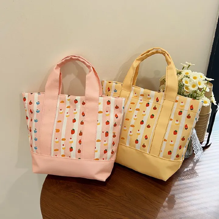 Carrying a bento bag while going out for work, commuting, mom's handbag, cute girl's handbag, and canvas bag
