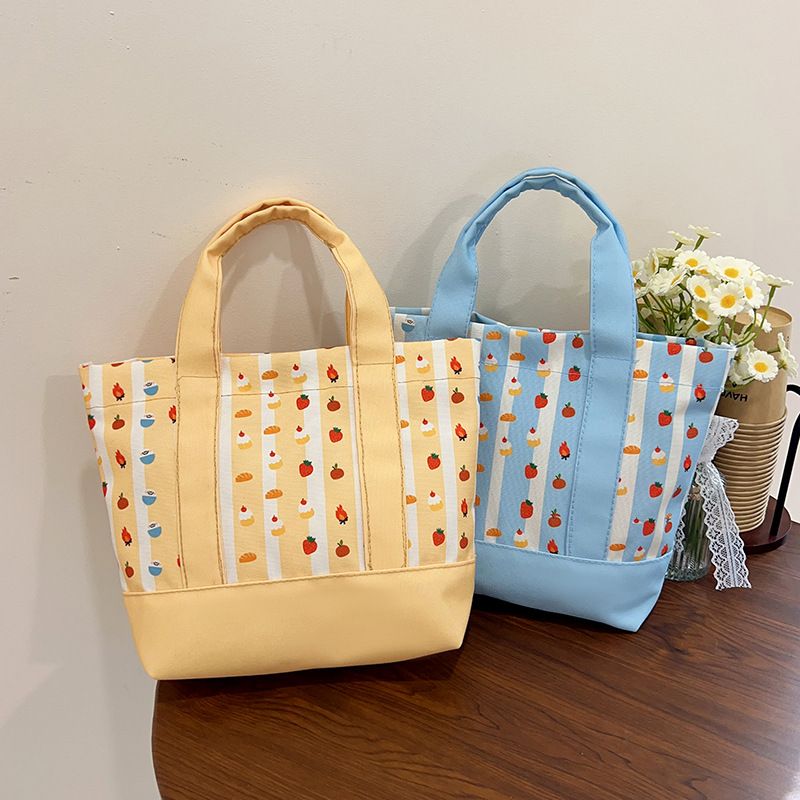 Carrying a bento bag while going out for work, commuting, mom's handbag, cute girl's handbag, and canvas bag