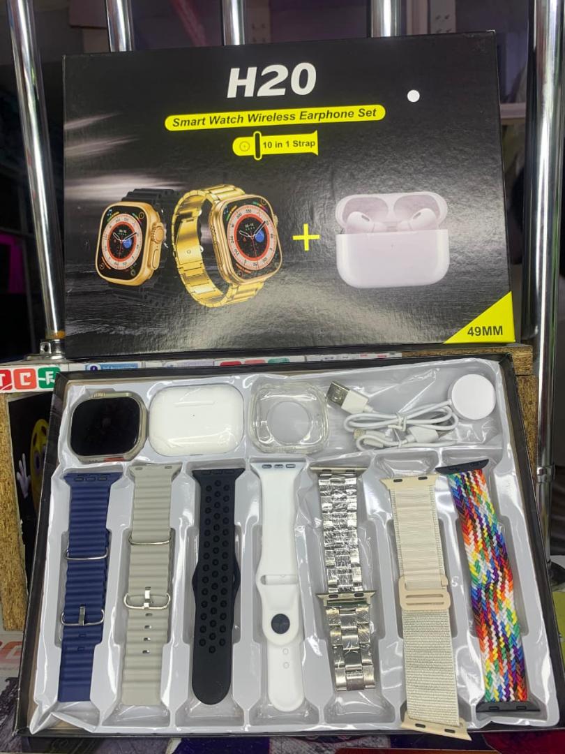 H20 max smart watch comes with 1 earbuds, 7 different colours straps  and charging cable
