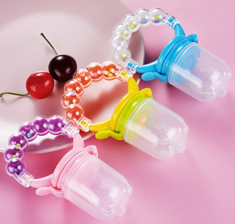 Baby Fruit Feeder Pacifier with Bell Ring – BPA-Free Silicone Teether and Food Feeder for Babies 0–2 Years – Purple