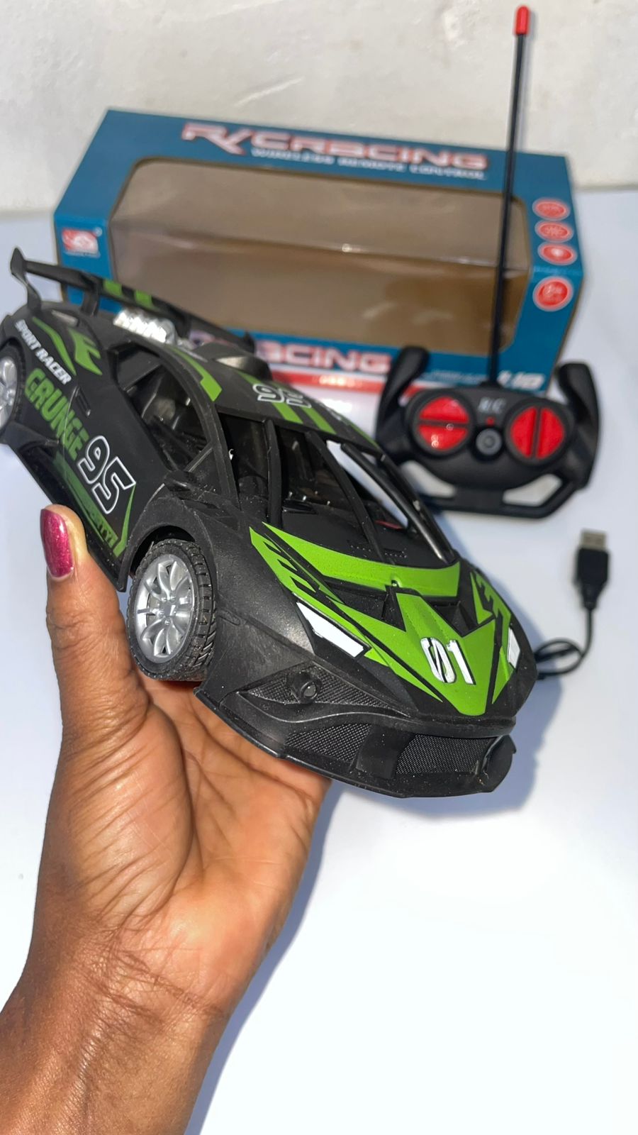 🏎️ RC Racing Car – High-Speed Remote Control Sports Car ⚡🏁 Sleek Design with Green & Black Finish🎮 Easy-to-Use Remote for Smooth Steering & Drifting | 🔋 USB Rechargeable Battery for Long Playtime