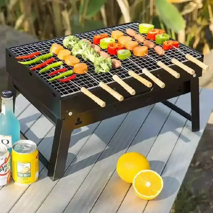 🍢🔥 Foldable Outdoor Charcoal Grill – Heavy-Duty Portable BBQ Barbecue Stove for Camping, Picnics & Home Grilling 😍🌲🔥 Efficient charcoal heating for rich, smoky flavor🍢 Comes