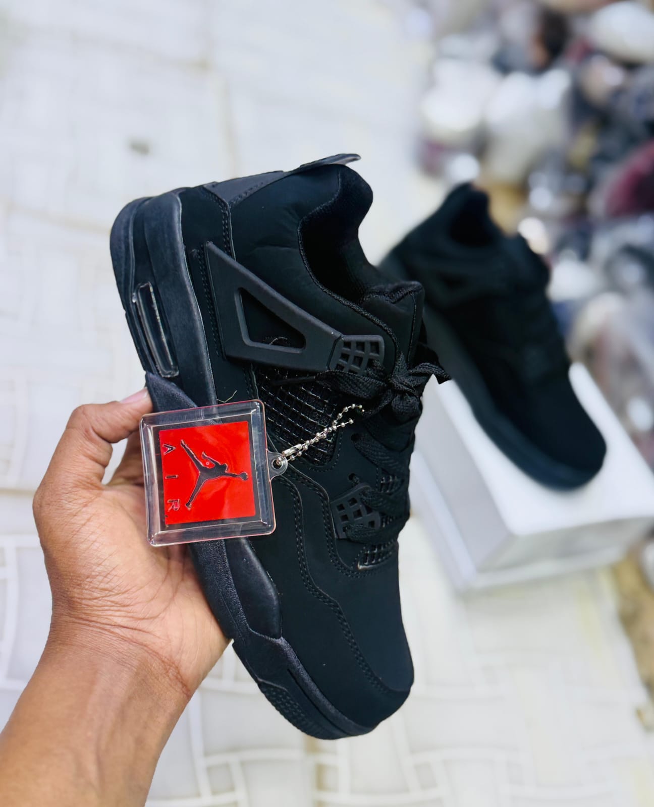 🔥 Air Jordan 4 Retro Premium Sneakers 👟💙🖤Step out in style with these bold and iconic Air Jordan 4 Retro sneakers — the perfect blend of comfort, performance