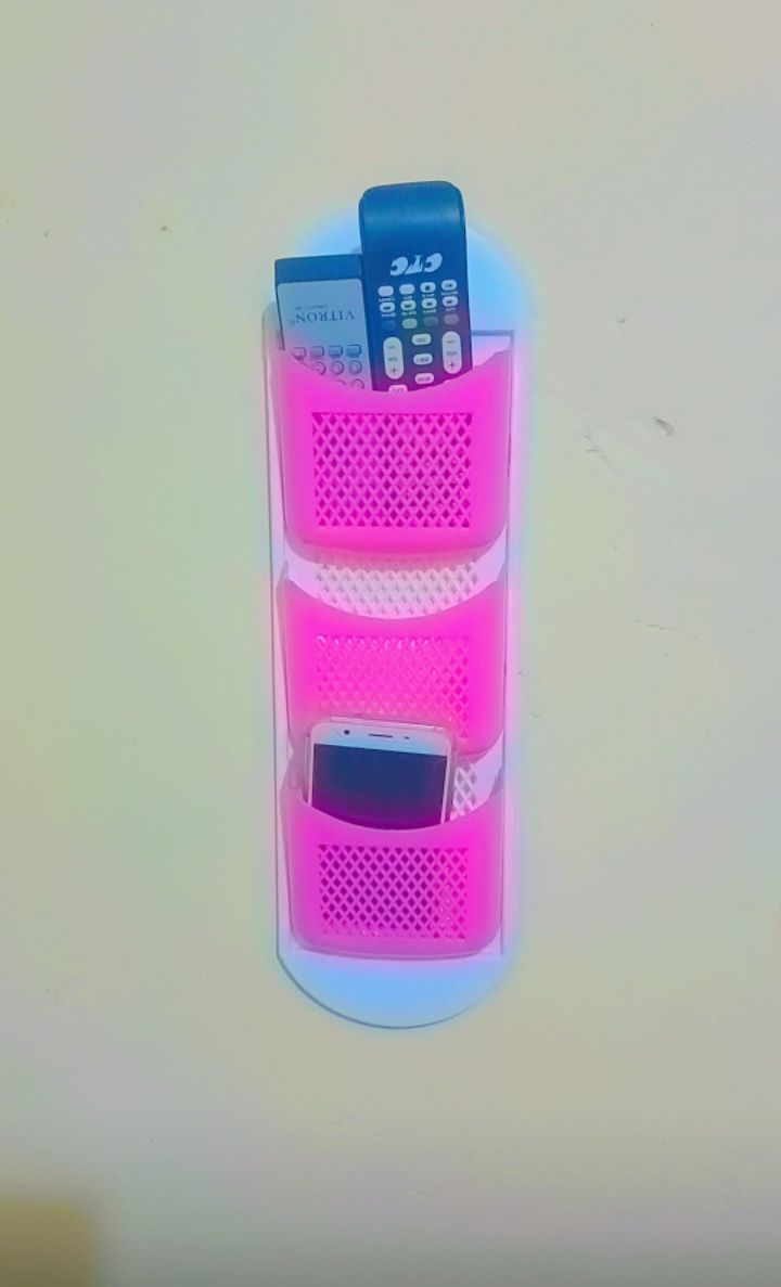 🛒 Stay organized – grab yours now at the best price 3 in 1 Classy Plastic Wall Mount organizing items such as mobile phones, remote controls, or other small household items.