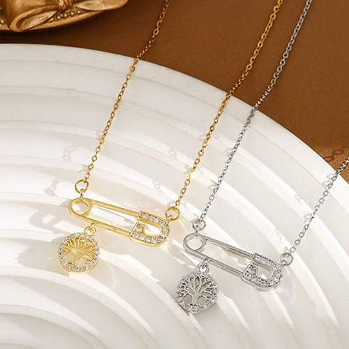 1 fashion stainless steel diamond-accented safety pin necklace with Tree of Life pendant, suitable for everyday wear.