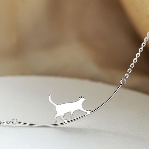 Steady & Stylish: Walking the Wire Cat Stainless Steel Pendant - Kenya Fashion