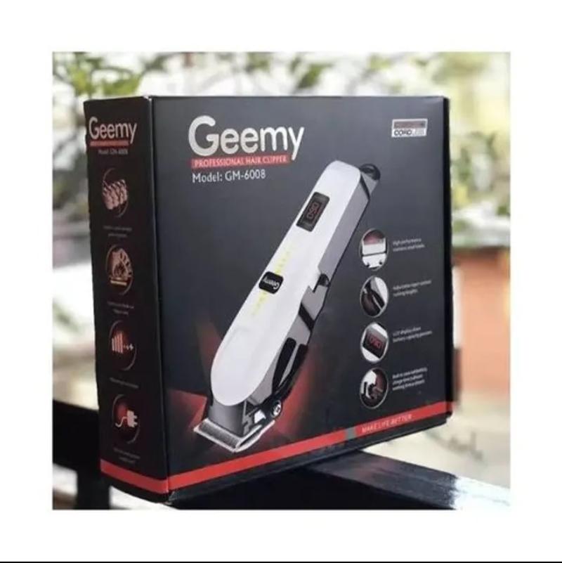 ORIGINAL GEEMY RECHARGEABLE CORDLESS SHAVING MACHINE WITH INDICATOR. GOOD QUALITY RECHARGEABLE HAIR TRIMMER/HAIR CLIPPER WITH LCD DISPLAY OF BATTERY INDICATOR.