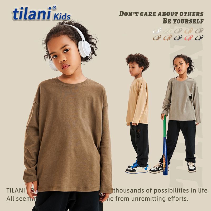 Children's clothing fashion trend brand Spring and Autumn children's long sleeved T-shirt base shirt loose solid color baby top