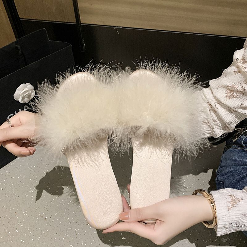 2025 Korean version summer new flat bottomed fluffy slippers for women wearing fashionable outerwear, internet celebrity, low heel cooldown, feather straight drag White 36