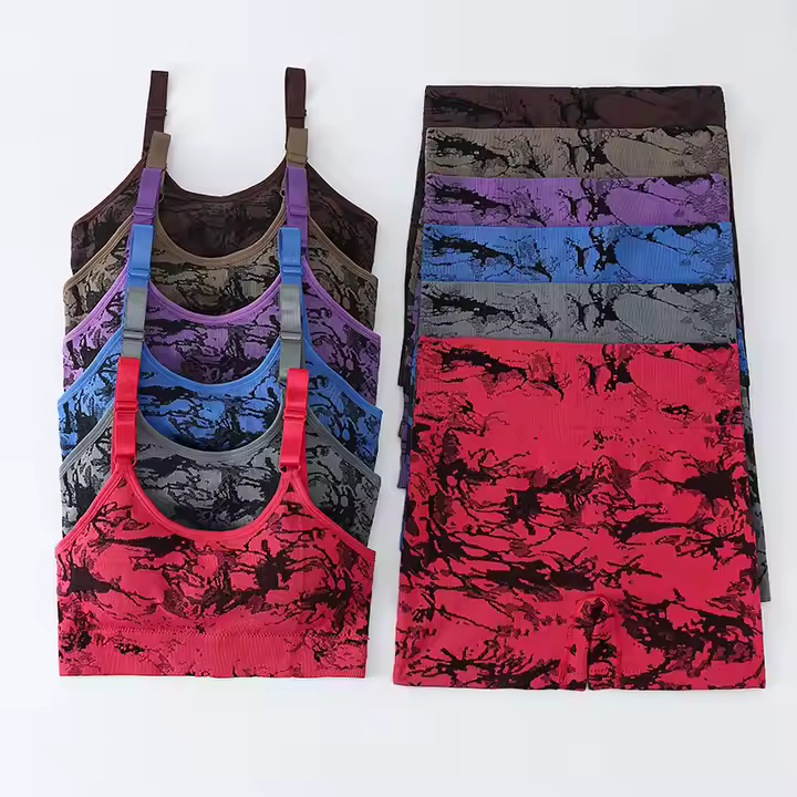 Abstract Tie-Dye Sports Set – Pink & Black  --Vibrant pink and black sports set with scoop-neck bra and high-rise shorts. Stretchy, supportive, and perfect for active or casual wear.