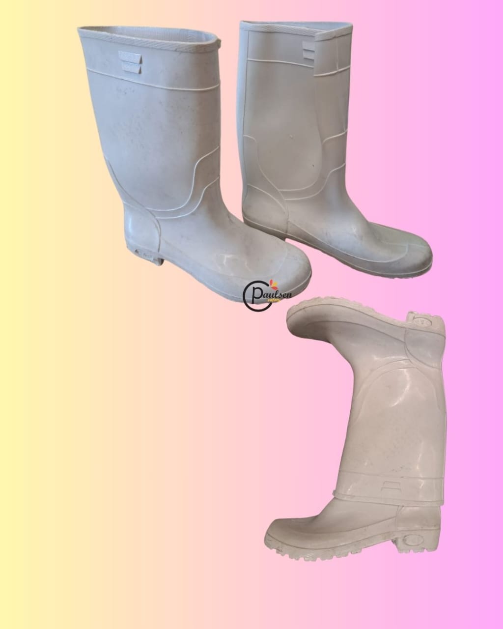 white PVC boots, also commonly known as gumboots. These boots are often used for protection in wet, muddy, or industrial environments, such as food processing, chemical plants, medical laboratories, o