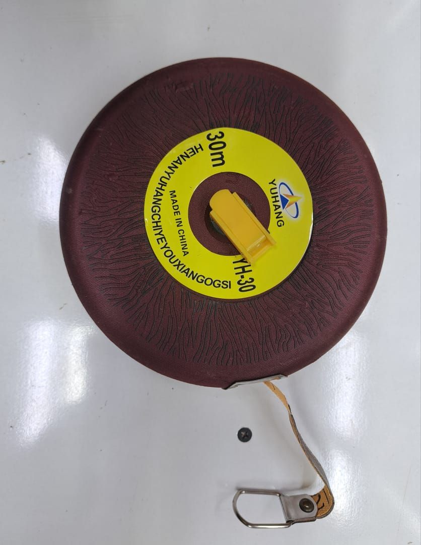 30m fiberglass measuring tape. 
Measuring range of 30 meters.
Made of fiber material.
Features a plastic enclosed case and flush winding handle for convenience.
Includes a metal hook on the end.