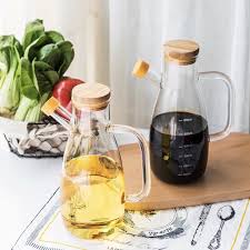 A 950ml oil jar is an essential kitchen accessory designed for convenient storage and precise pouring of cooking oils. Crafted from high-quality, food-grade materials such as thickened glass, stainles