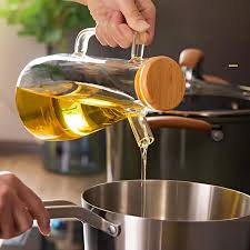 A 950ml oil jar is an essential kitchen accessory designed for convenient storage and precise pouring of cooking oils. Crafted from high-quality, food-grade materials such as thickened glass, stainles