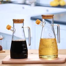 A 950ml oil jar is an essential kitchen accessory designed for convenient storage and precise pouring of cooking oils. Crafted from high-quality, food-grade materials such as thickened glass, stainles