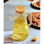 A 950ml oil jar is an essential kitchen accessory designed for convenient storage and precise pouring of cooking oils. Crafted from high-quality, food-grade materials such as thickened glass, stainles