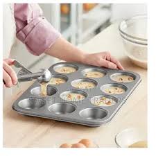 ChatGPT said:

A 12-hole cupcake tin is an essential bakeware item designed for creating evenly sized cupcakes and muffins. Made from durable metal, often carbon steel or aluminum, it provides excelle