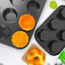 ChatGPT said:

A 12-hole cupcake tin is an essential bakeware item designed for creating evenly sized cupcakes and muffins. Made from durable metal, often carbon steel or aluminum, it provides excelle