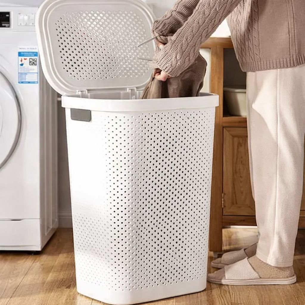 New square Laundry Basket With A Lid; This baskets fit any laundry room, make dirty clothes appear to be part of the decoration