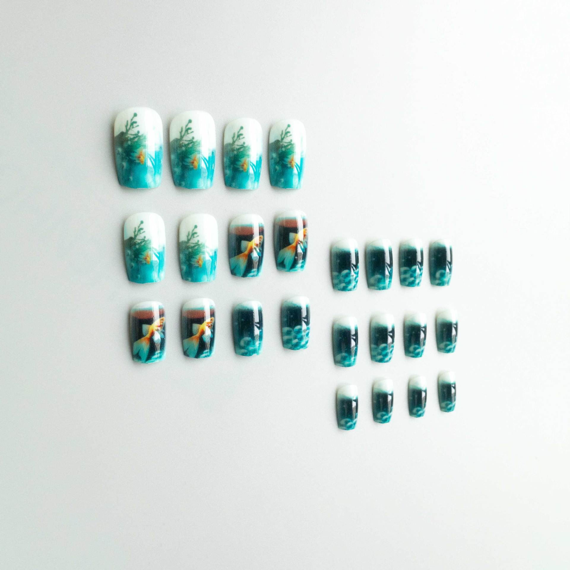 Mascara painting scene of goldfish swimming in the rippling water dream. Wearing 24 pieces of makeup. view 7
