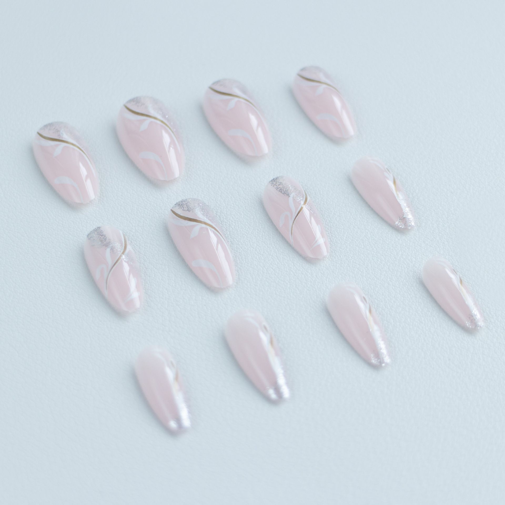 Wear the new almond-shaped sparkly fairy-style nail polish. This is a beautiful nail art product.