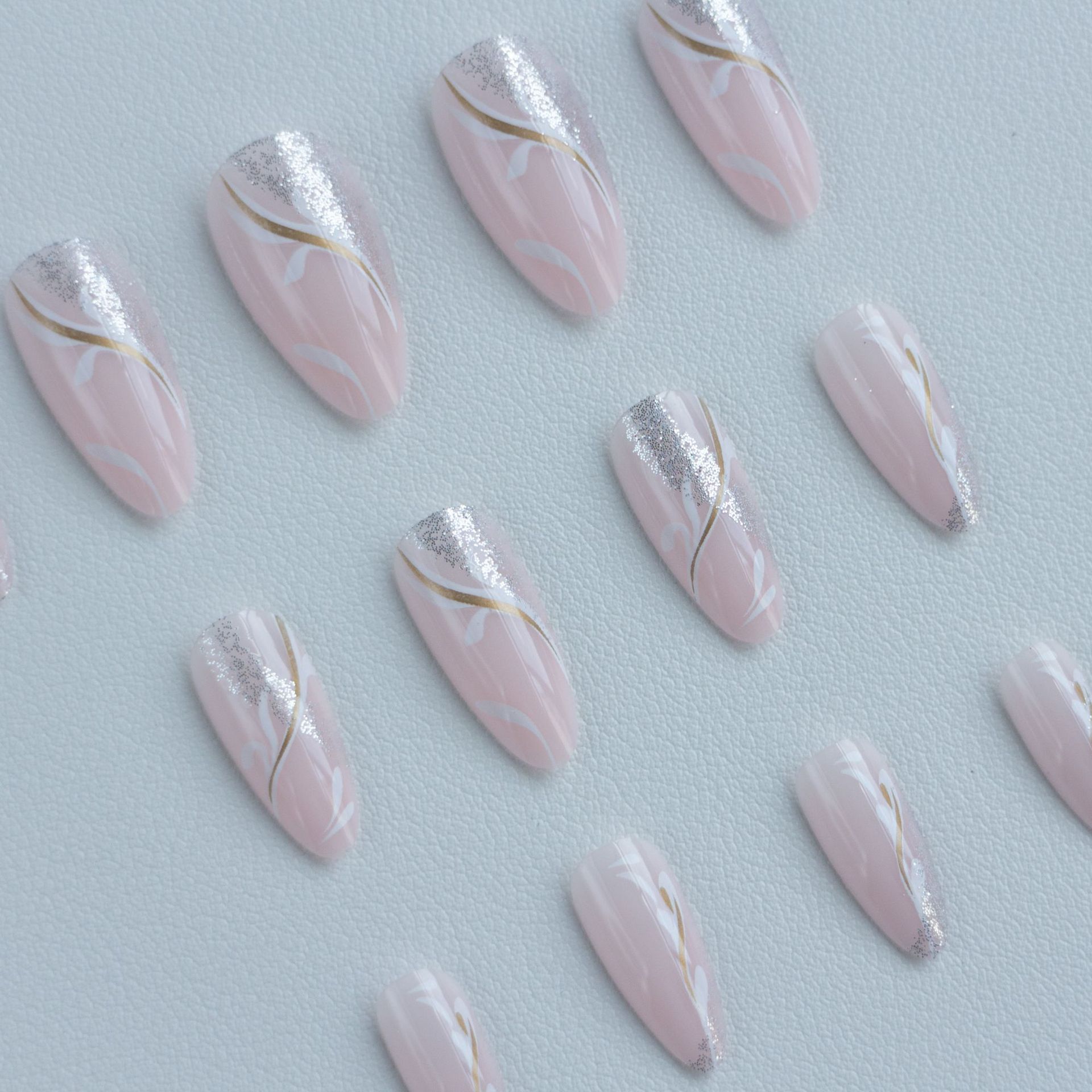 Wear the new almond-shaped sparkly fairy-style nail polish. This is a beautiful nail art product.