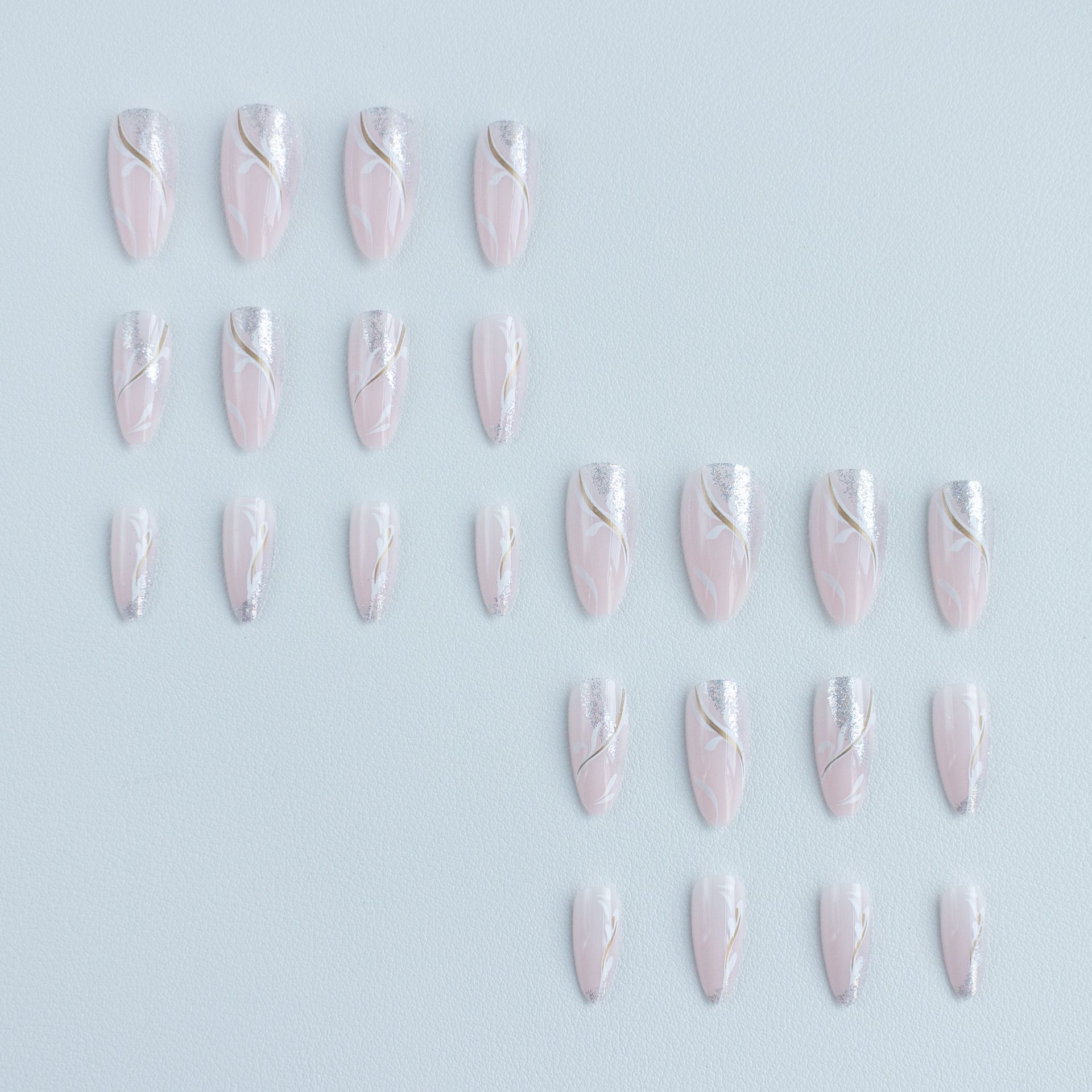 Wear the new almond-shaped sparkly fairy-style nail polish. This is a beautiful nail art product.