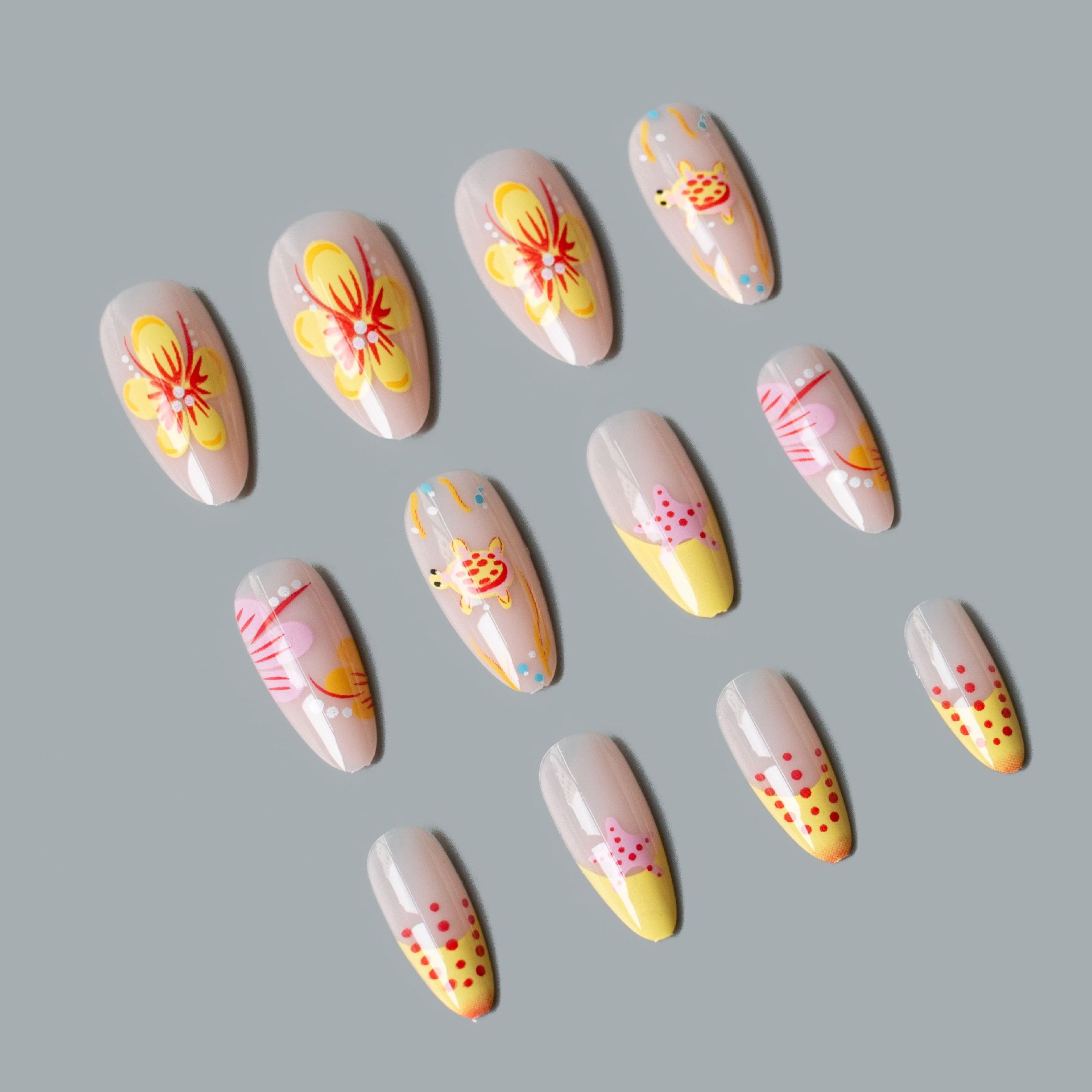 Cute and charming powder orange ocean-themed cute creature paradise nail art set with 24 detachable and wearable nail decorations
