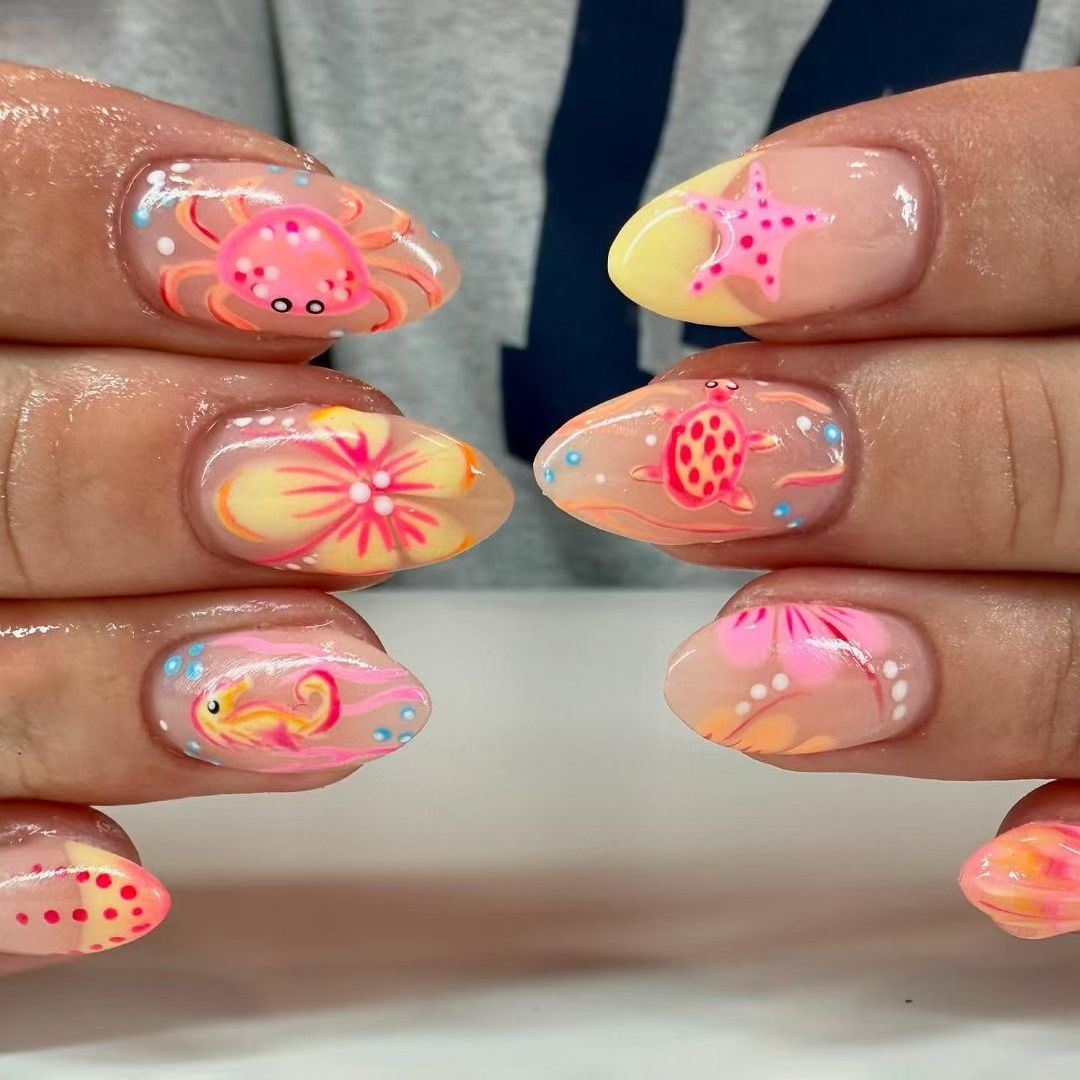 Cute and charming powder orange ocean-themed cute creature paradise nail art set with 24 detachable and wearable nail decorations