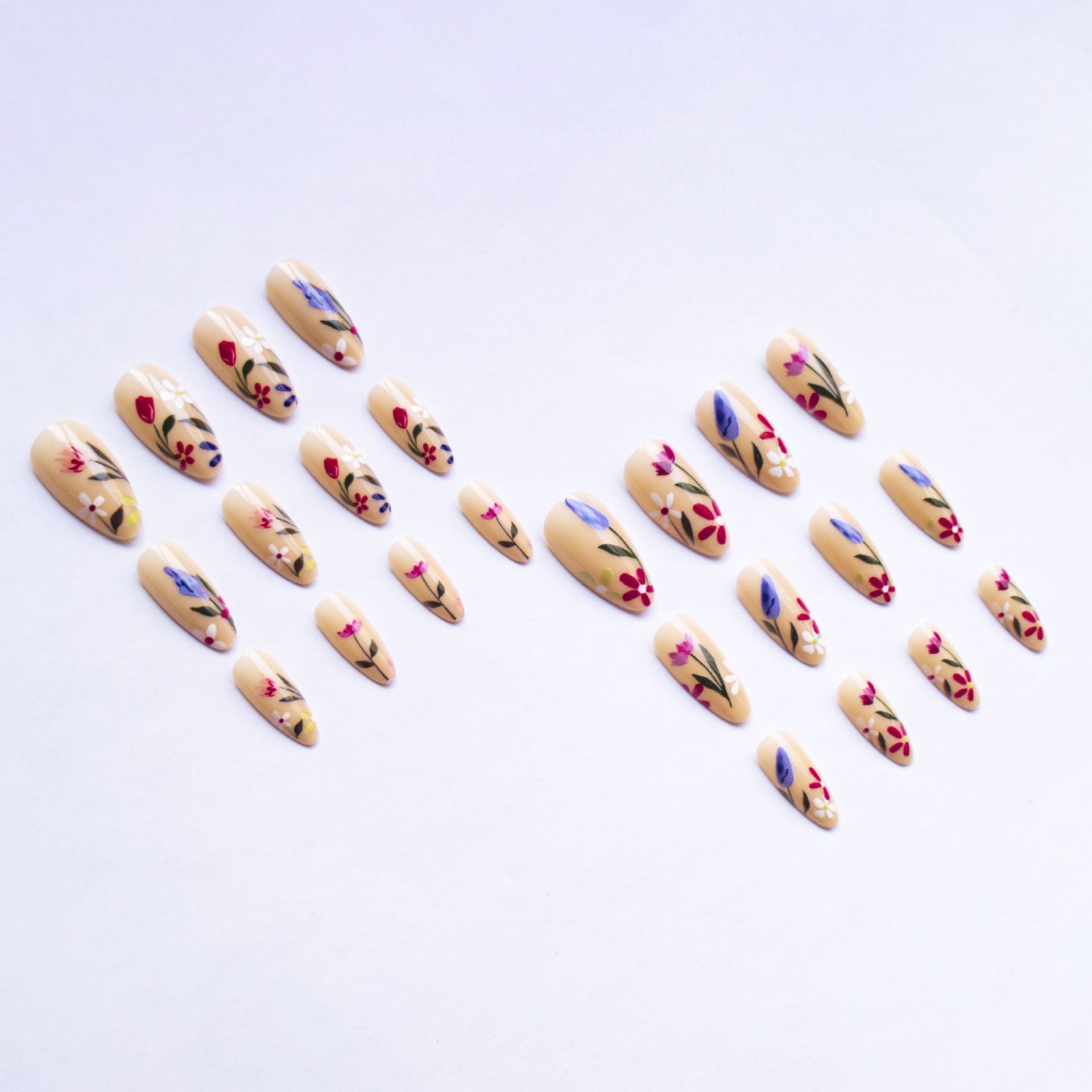 Wear elegant almond-shaped fresh flower style nail polish for a festive and charming look. Comes with 24 detachable pieces. view 3