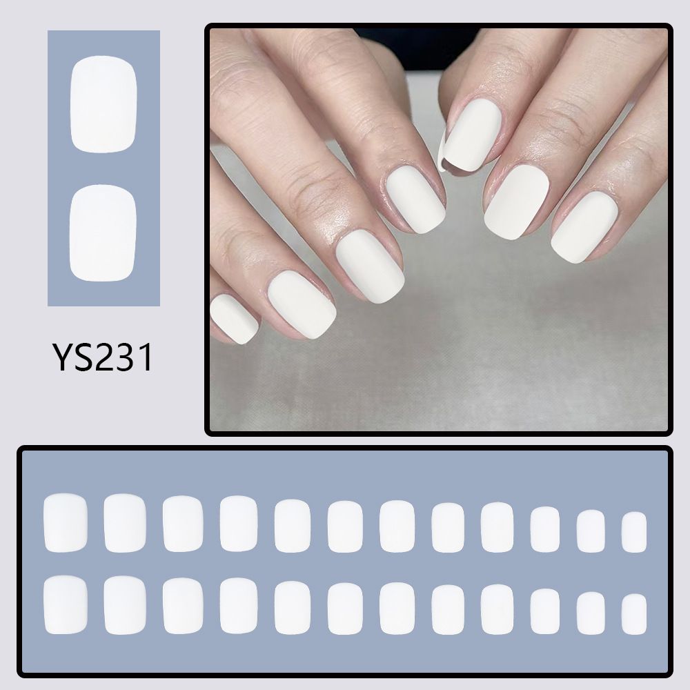 New product - wearable armor. Simple matte white short fake nail pieces. Wearable nail art stickers. Finished nail sheet stickers. 24 pieces of nail art.