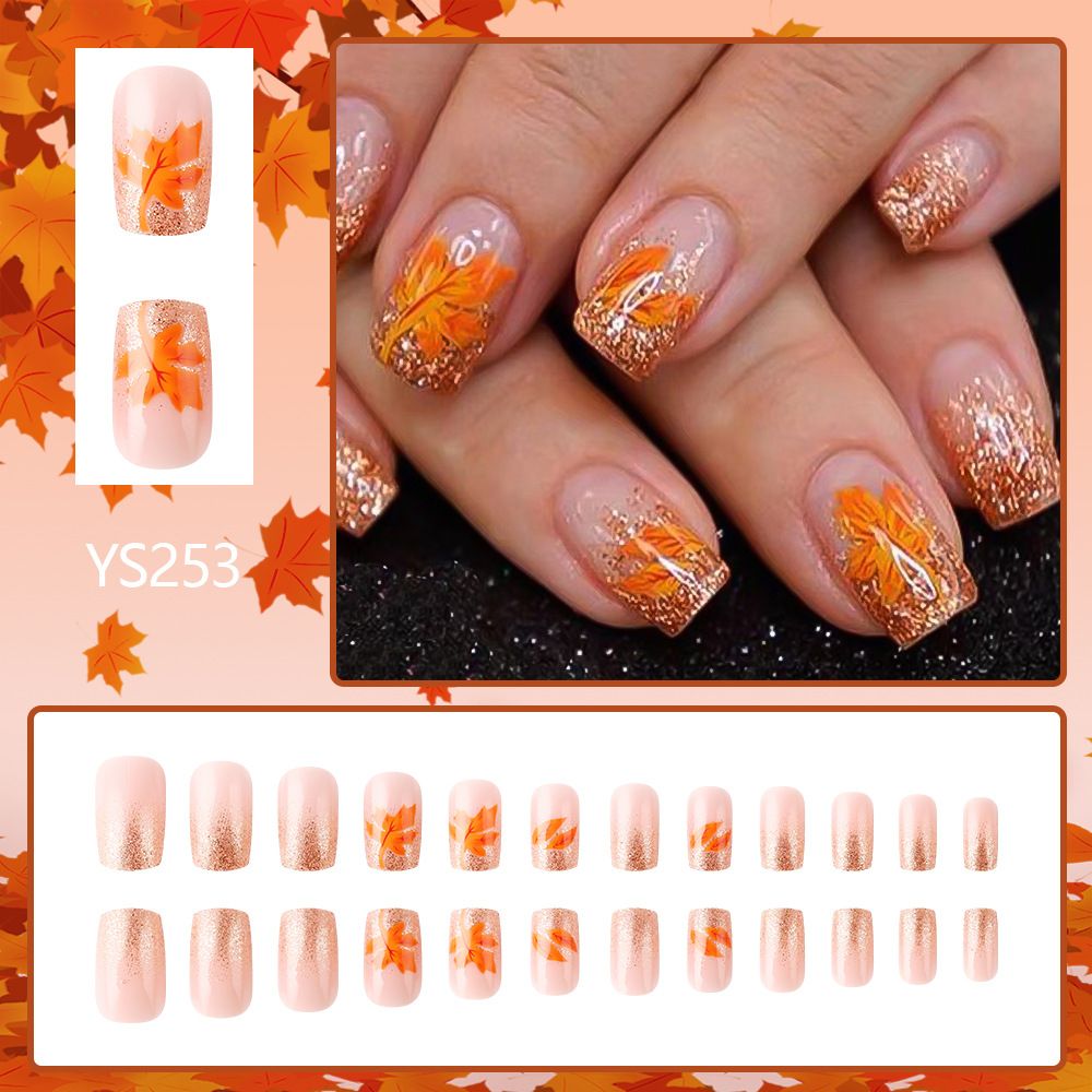 Daily style short-style armored nail sticker with shiny golden glitter and maple leaf design. 24 pieces of fake nails for export. Nail sticker. view 2