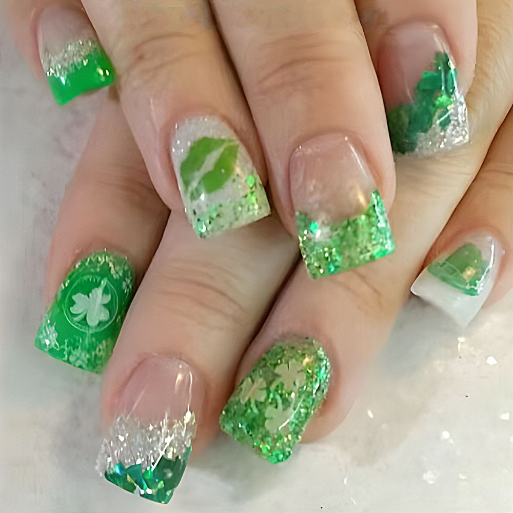 Short shiny four-leaf clover nail art for 2025 St. Patrick