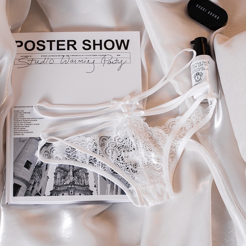 Women's lace underwear French European and American sexy pure lust transparent cross beautiful buttocks temptation hollow pure lust strap women's underwear