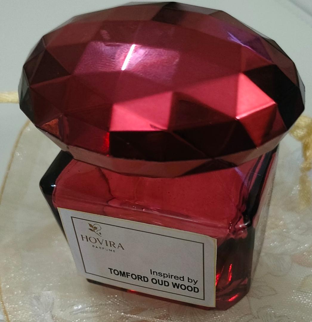 Tom Ford Oud Wood is a luxurious, unisex fragrance with rich oud, warm spices, and smooth woody notes, offering a deep, exotic, and sophisticated scent.