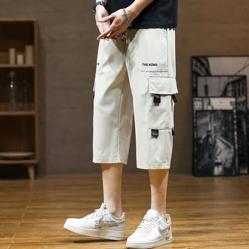 New summer sports overalls men's cropped trousers men's ice silk thin fashion pants casual shorts.