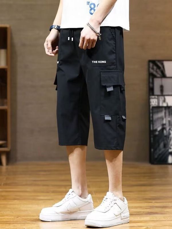 New summer sports overalls men's cropped trousers men's ice silk thin fashion pants casual shorts.