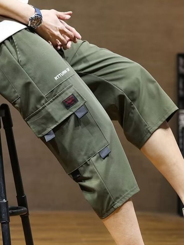 New summer sports overalls men's cropped trousers men's ice silk thin fashion pants casual shorts.