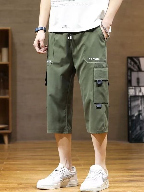 New summer sports overalls men's cropped trousers men's ice silk thin fashion pants casual shorts.