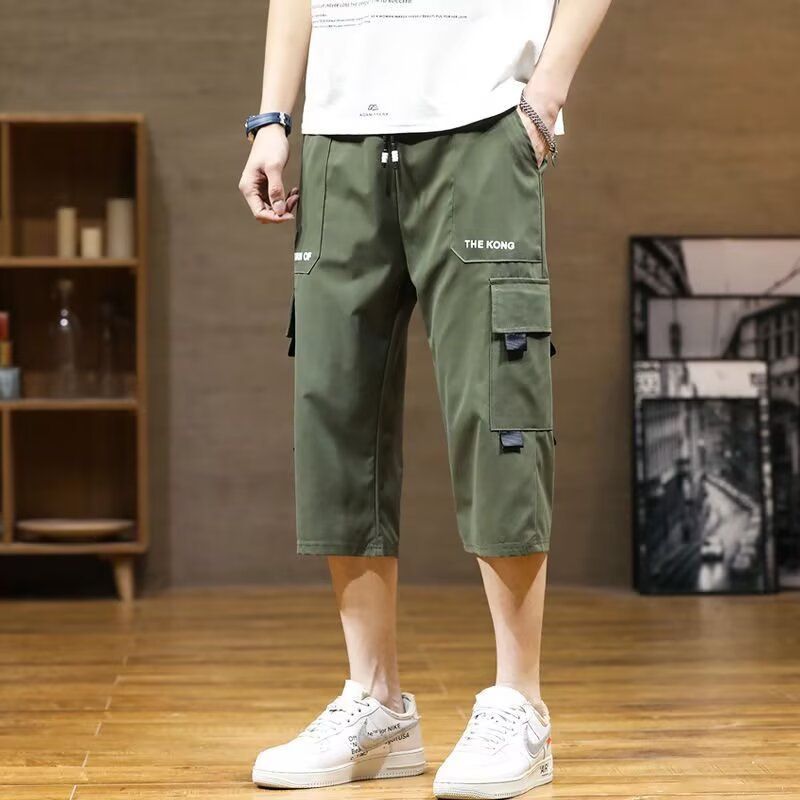 New summer sports overalls men's cropped trousers men's ice silk thin fashion pants casual shorts.