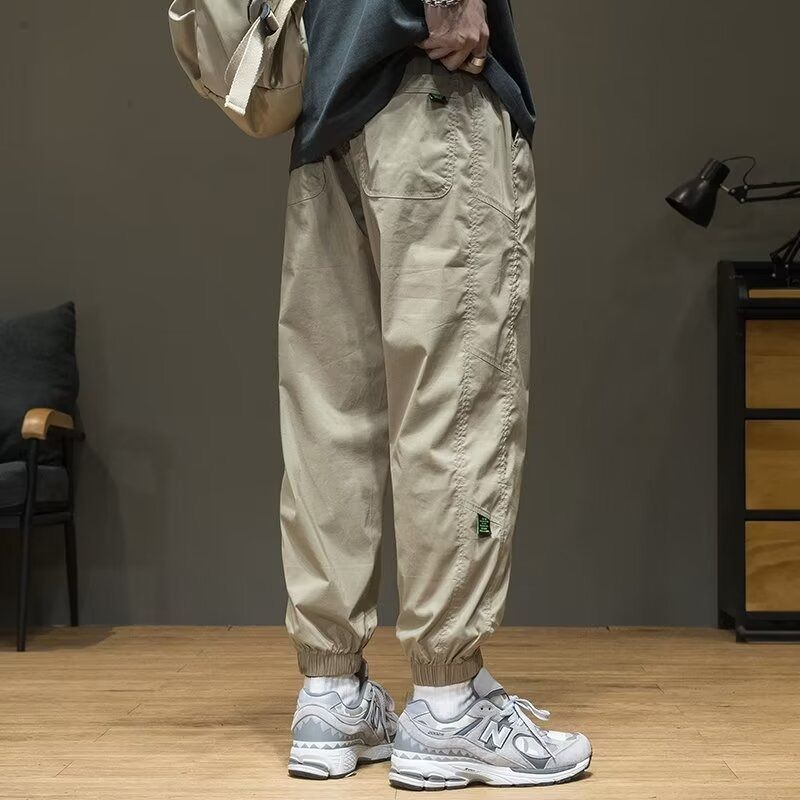 The new men's overalls in summer are simple and elastic, and the waist is fast-drying sweatpants. The tide brand is loose, and the feet are tied with ice silk casual pants