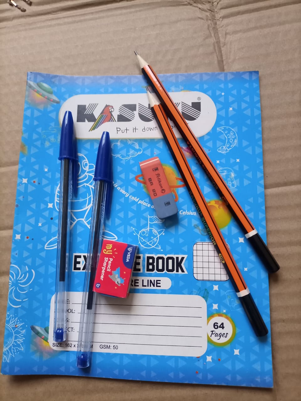 12 pcs A5single line 64 pages books 11 single+1 squared + 2 free hp pencil + 1 rubber+1 shappener + 2 big biro pens
