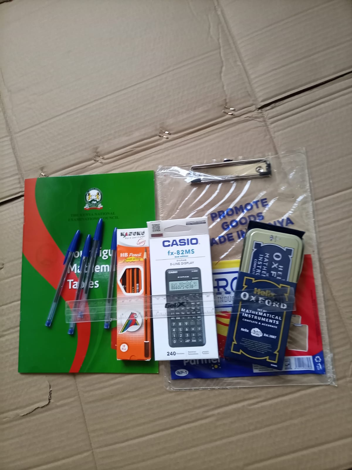 CALCULATOR + Set+12 pencis+ 2rubbers+ruller +4BIG biro pens+ log table +transparent clipboard