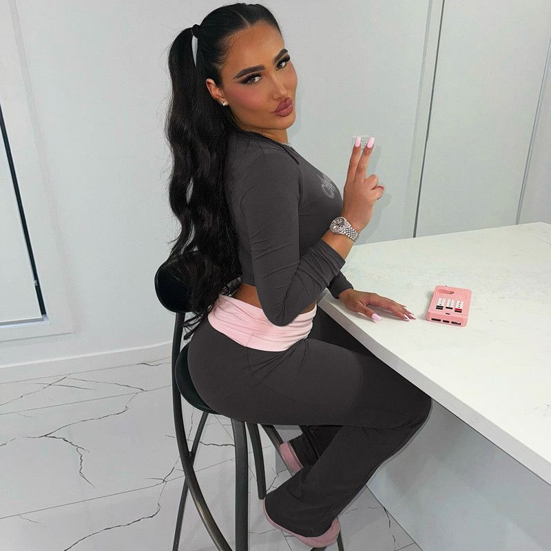 European and American women's clothing, new color blocking round neck long sleeved flared pants two-piece set, fashionable hot stamping set