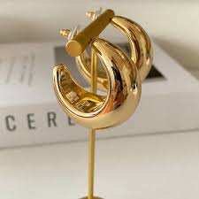 pair of gold-plated chunky hoop earrings.