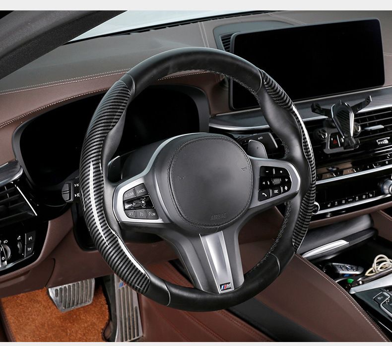 Half-pack carbon fiber car steering wheel cover four seasons constant temperature carbon fiber black non-slip sweat-absorbent car universal grip cover