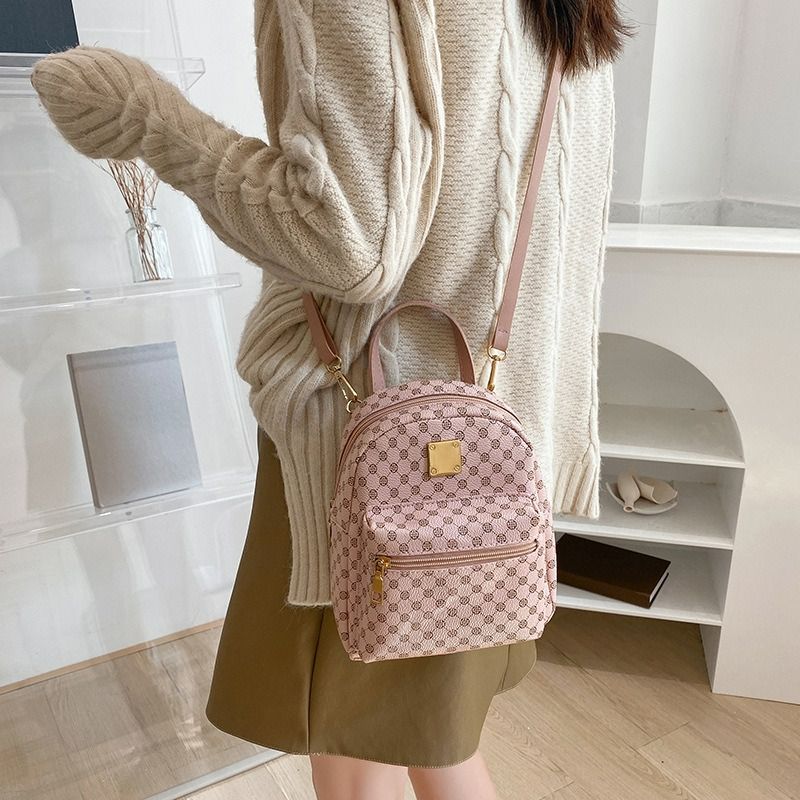 Ladies front pocket printed small backpack 2024 autumn and winter Korean version of the new product personality daily change small bag