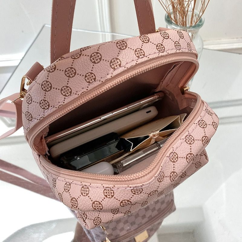 Ladies front pocket printed small backpack 2024 autumn and winter Korean version of the new product personality daily change small bag