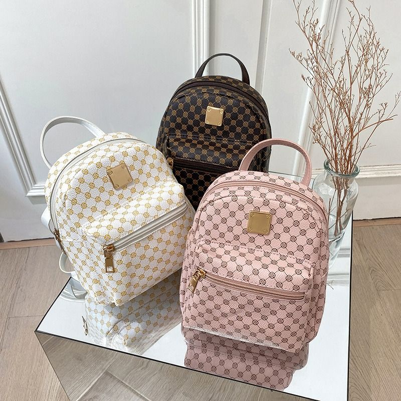 Ladies front pocket printed small backpack 2024 autumn and winter Korean version of the new product personality daily change small bag