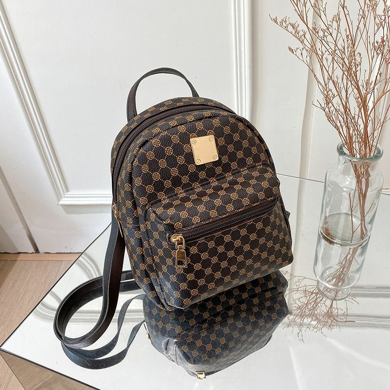 Ladies front pocket printed small backpack 2024 autumn and winter Korean version of the new product personality daily change small bag